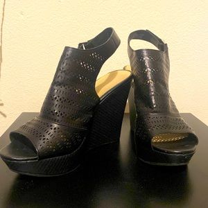 Black faux leather cutout wedges